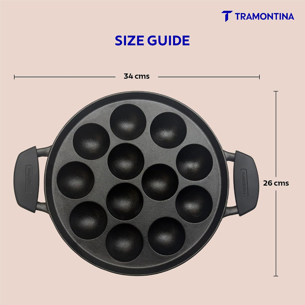 TRAMONTINA Titanex 26 cm Pre-Seasoned Cast Iron Paniyaram | Appe Pan – 12 Pits | Non-Toxic | Induction Ready | Toughned Glass Lid | Snap-on Cool Touch Grips | Superior Heat Retention.